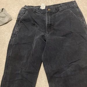 Black carhartt torn right leg at bottom easy fix